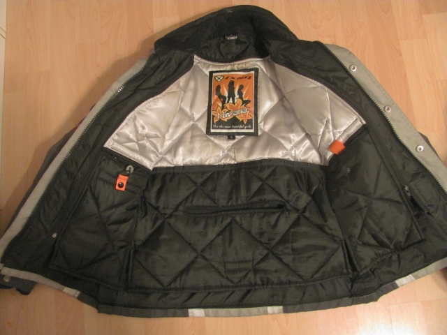 the ixon jacket spread open showing the liner inside